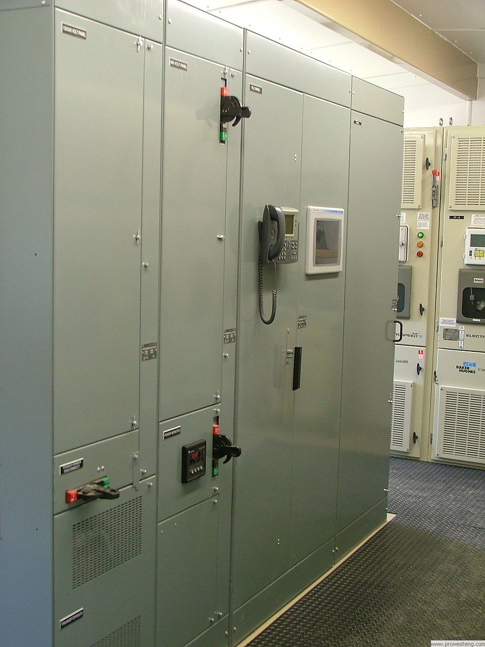 Low Voltage Motor Control Center line-up with integrated PLC control panel and communications equipment.